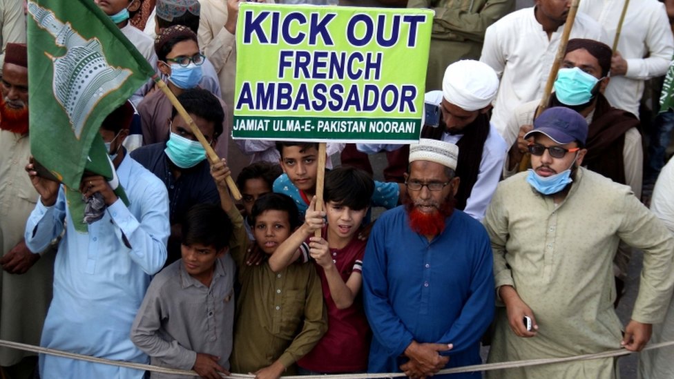 Protesters demanding the French Ambassador to be expelled