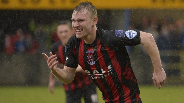 Andrew Mitchell celebrates scoring in the Irish Cup for Crusaders