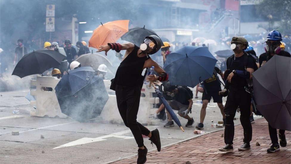 Protesters throwing bricks