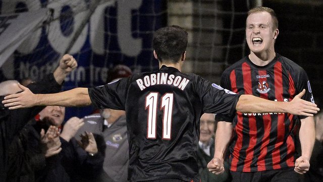 Jordan Owens celebrates with team-mate Josh Robinson at Seaview