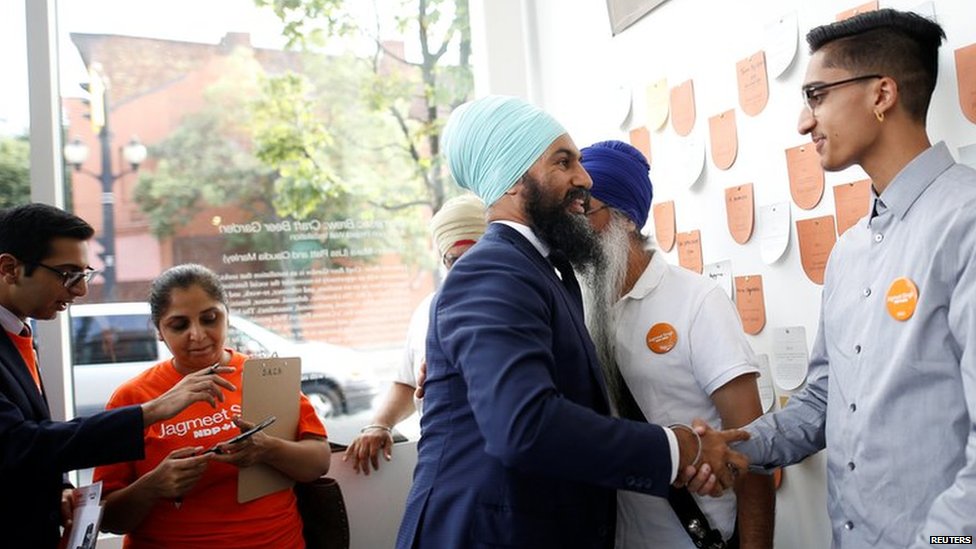 New Democratic Party leadership candidate Singh shakes hands with people at a meet and greet event in Hamilton.