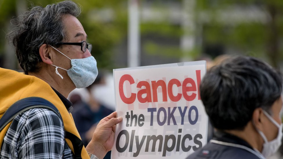 Tokyo Olympics: Why doesn't Japan cancel the Games? - BBC News