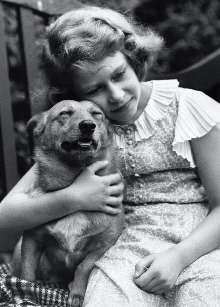 Princess Elizabeth, aged 10, with her pet dog, London.