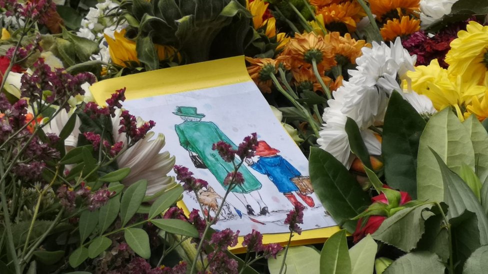 Eleanor's artwork left among floral tributes