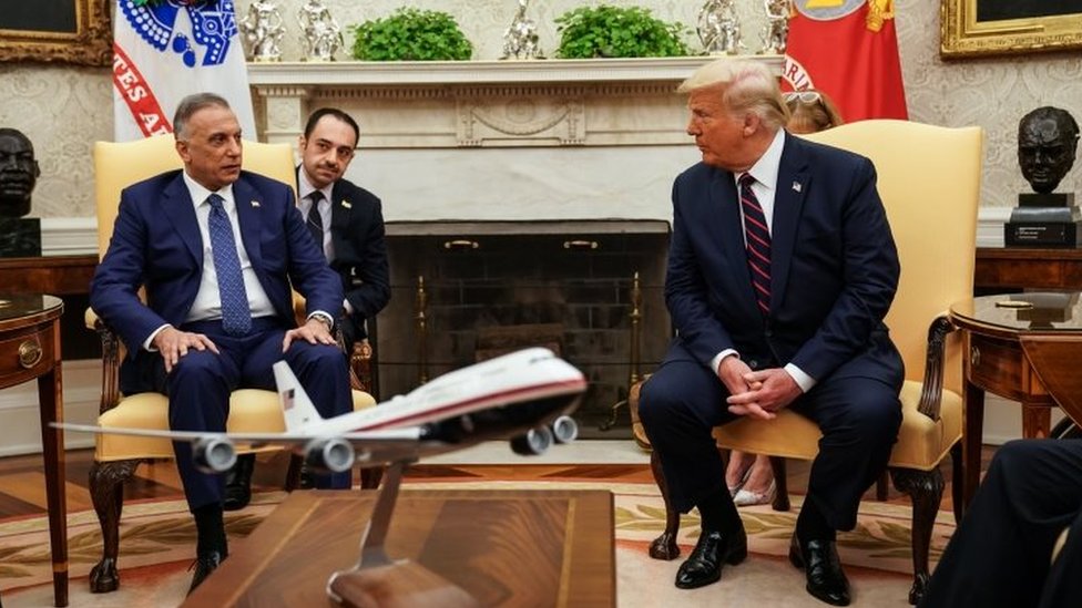 Iraqi Prime Minister Mustafa al-Kadhimi talks to US President Donald Trump at the White House on 20 August 2020
