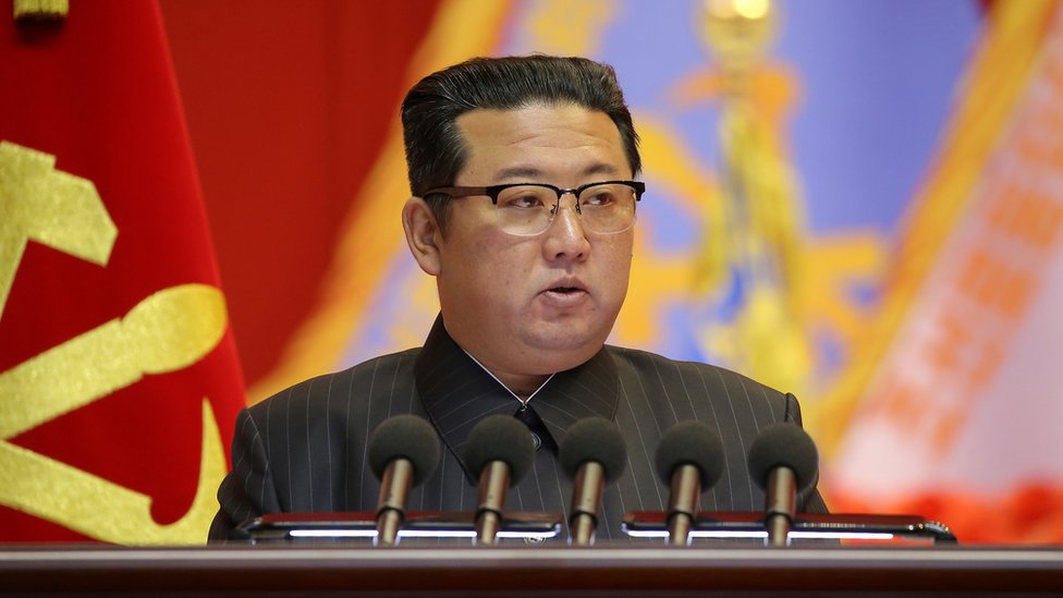 Kim Jong-Un addressing a conference