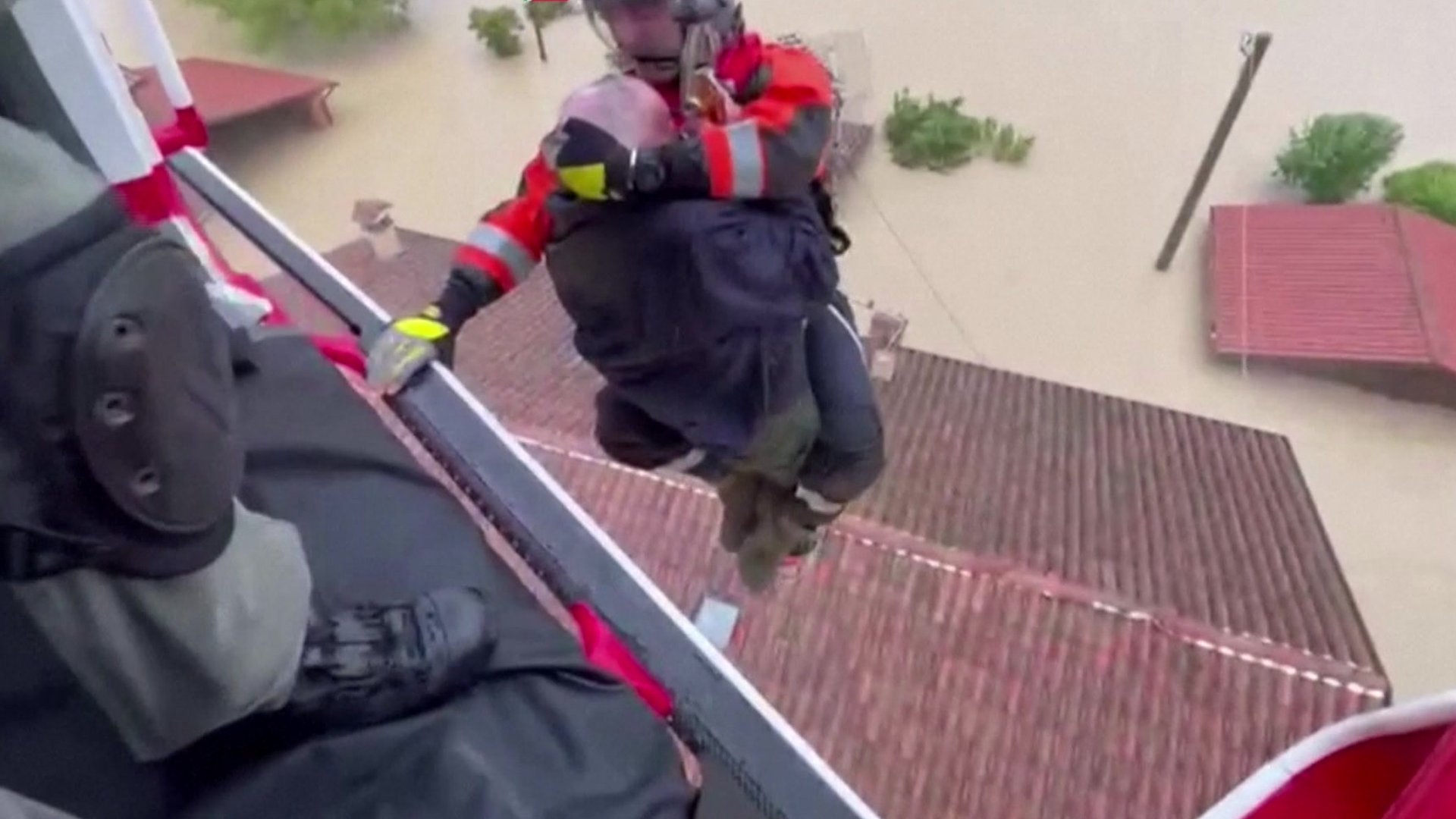 Watch: Elderly couple rescued from rooftop amid deadly Italy floods