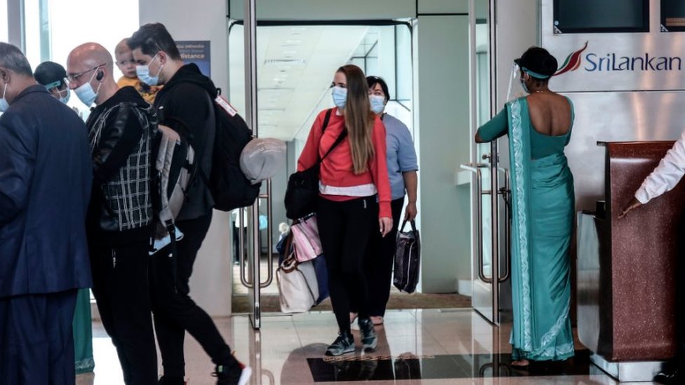 Ukrainian passengers arrive at Sri Lanka's Mattala Rajapaksa International Airport, in Mattala