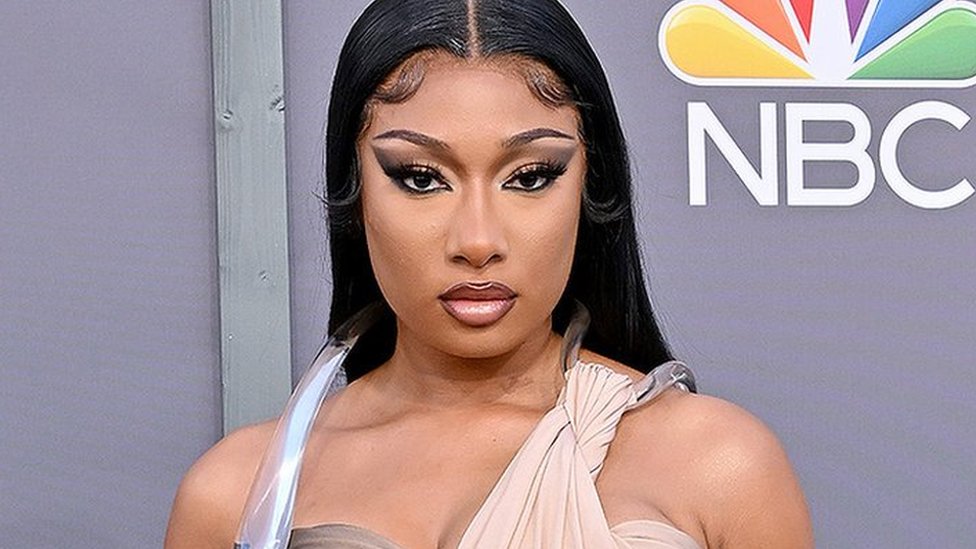 Megan Thee Stallion living with bullet fragments in feet after shooting - BBC News