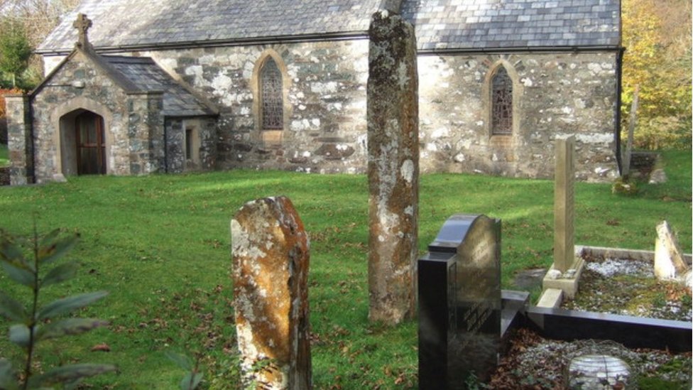 What do Medieval carved stones and Celtic crosses in Wales symbolise