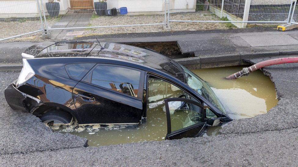 Brentwood sinkhole: Car falls into hole and homes evacuated