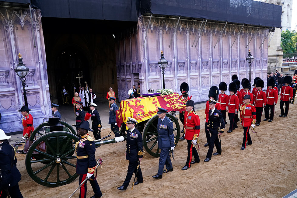 The gun carriage carrying the Queen's coffin arriving at Westminster Hall