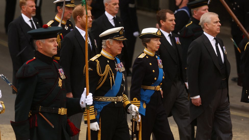 Members of the Royal Family walk behind the Queen's coffin