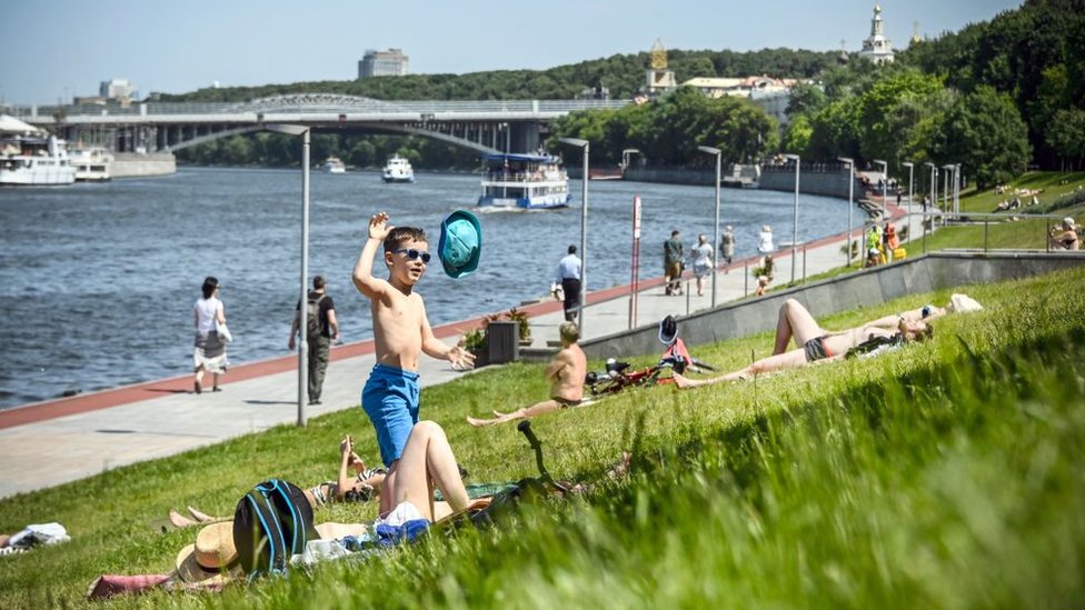 Sunbathing on the Moscow river, summer 2023