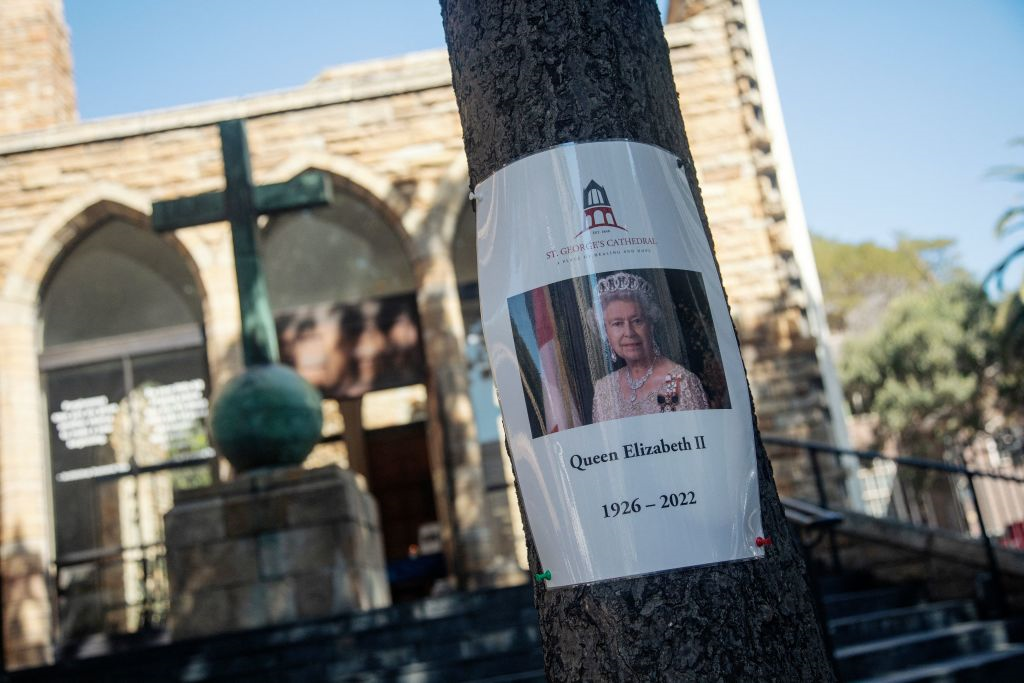 A tribute to the queen outside St George's Cathedral in Cape Town, South Africa.  Inside, visitors sign a tribute book.