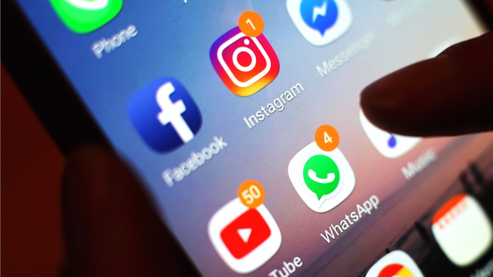 Social media apps, including Facebook, on a smartphone