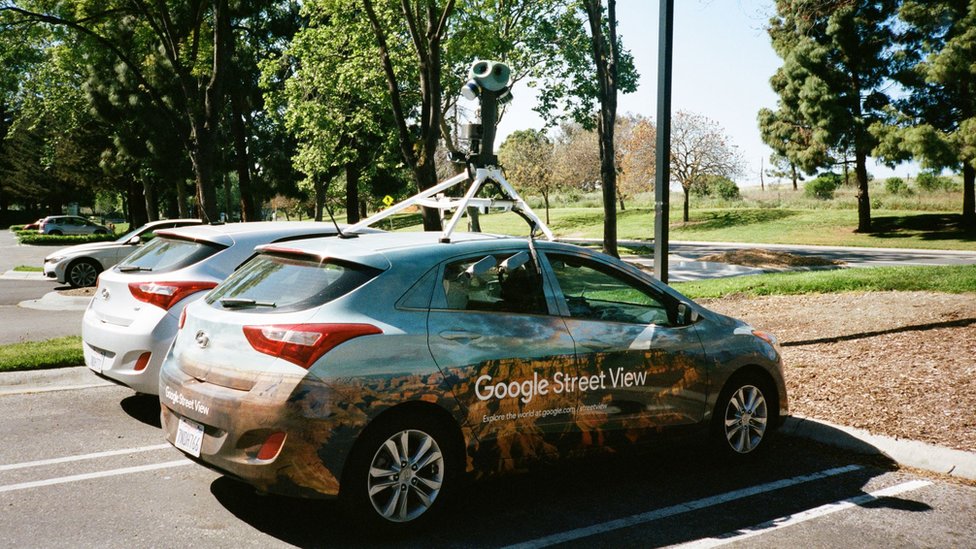 Google Street View vehicle with Street View logo and automated 3D camera system parked at the Googleplex, the Silicon Valley headquarters of search engine and technology company Google Inc in Mountain View, California, April 14, 2018