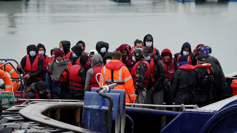 A group of people thought to be asylum seekers brought into Dover by Border Force