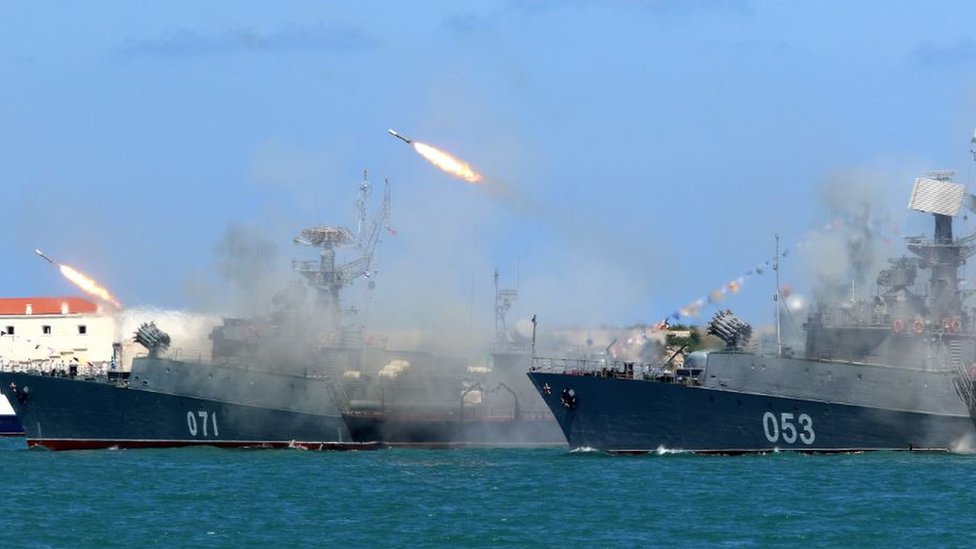 Russian ships firing missiles while take part in the Navy Day parade in Sevastopol