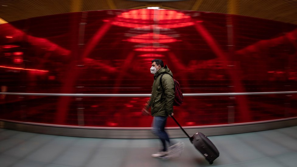 A traveller at Adolfo Suarez Barajas airport in Madrid
