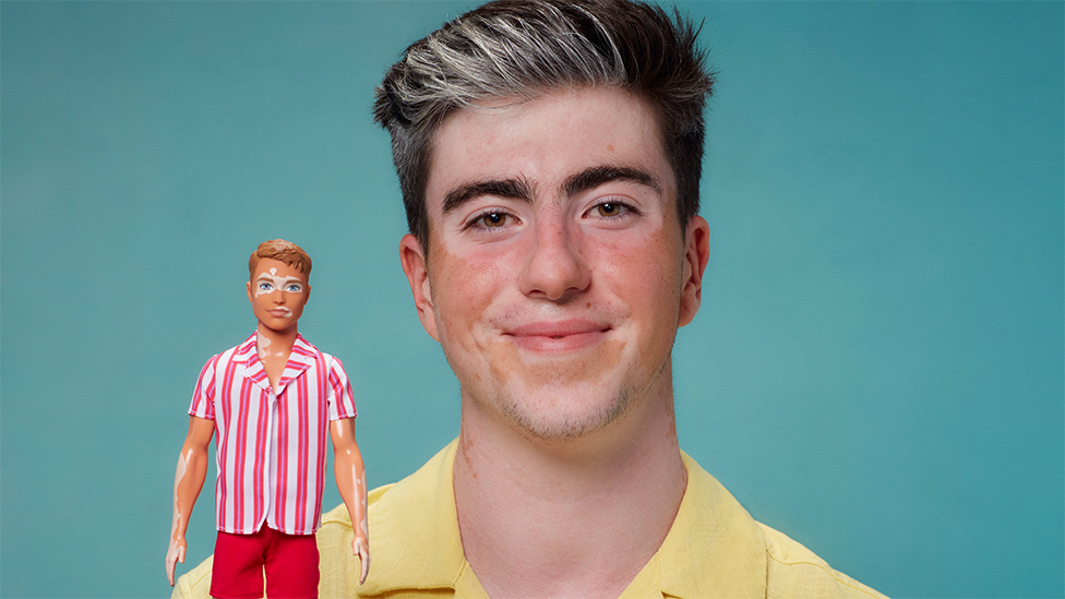 James with his doll