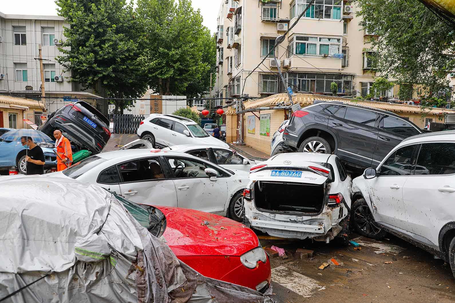 Cars blown over after Super Typhoon Doksuri in Jinan, China - 29 July, 2023.