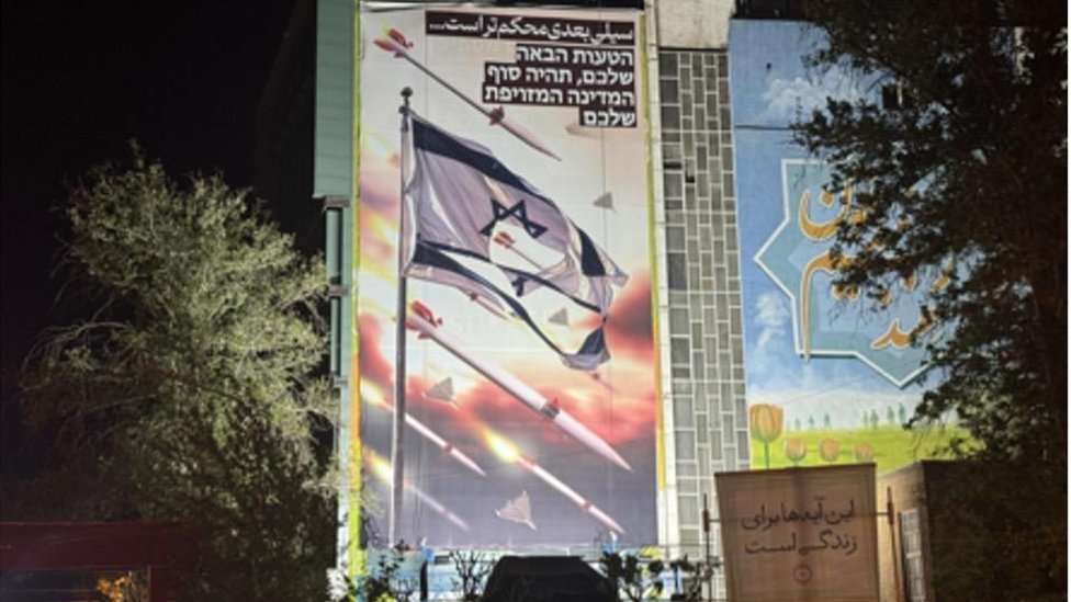 An anti-Israel billboard carrying a sentence reading in Persian 'Next slap will be harder' in Tehran, Iran, 14 April 2024.