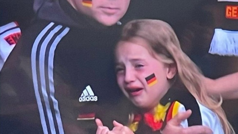 the little girl crying at the match