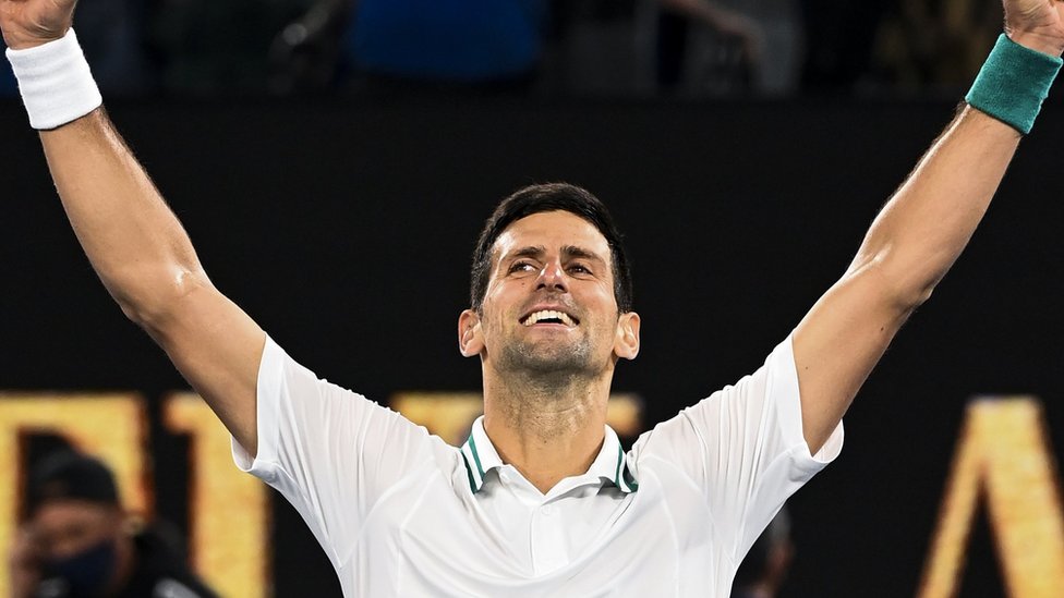 Novak Djokovic celebrates his Australian Open win