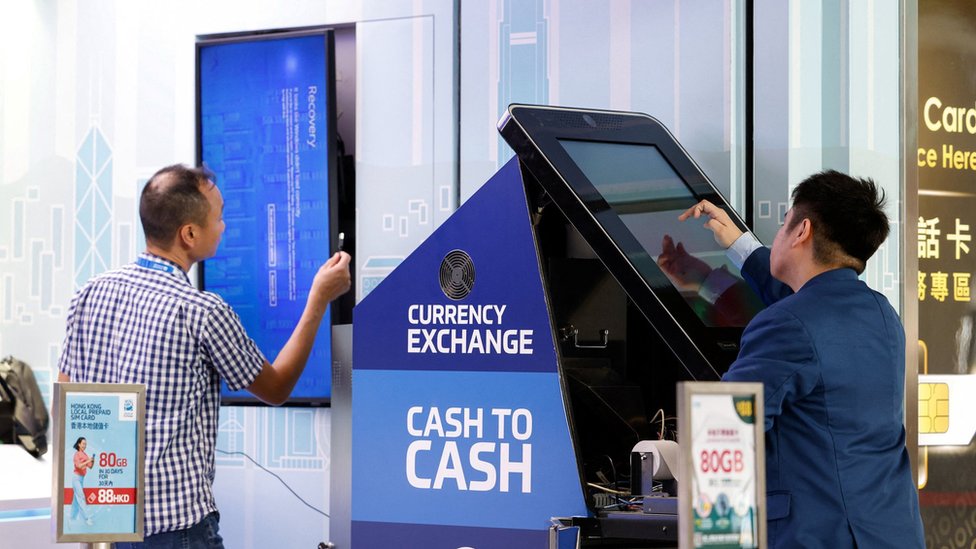 Currency Exchange at Hong Kong airport: Screen showing an error is seen at a currency exchange store at Hong Kong International Airport amid system outages disrupting the operations, in Hong Kong, China, July 19, 2024.