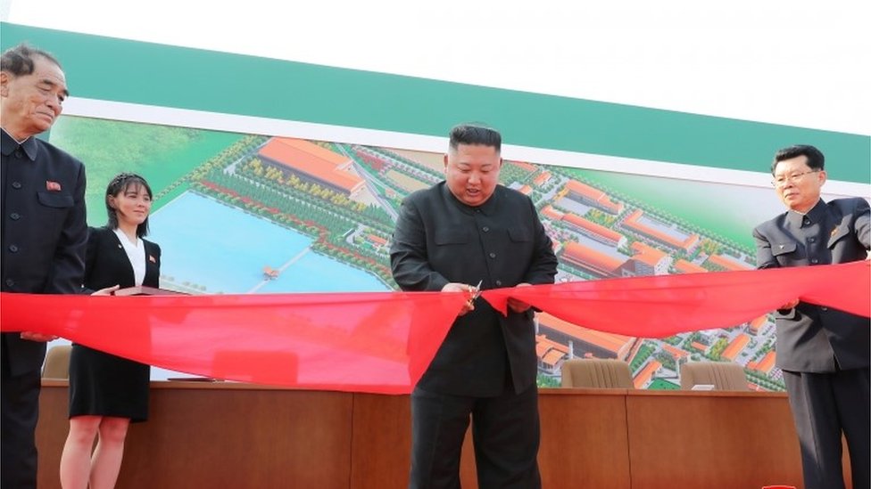 North Korea's leader Kim Jong-un pictured by state media opening a fertiliser factory on 1 May 2020