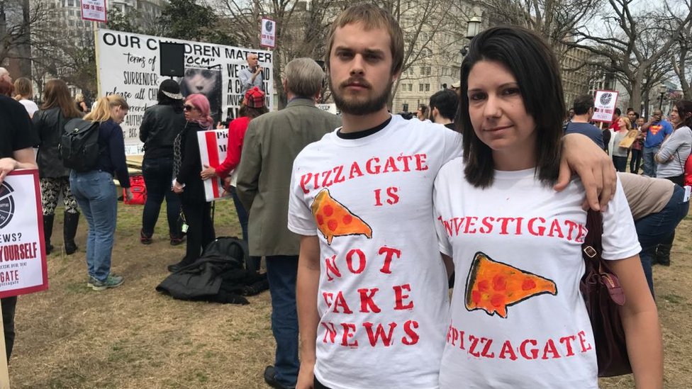 Followers of the Pizzagate conspiracy theory at a demonstration