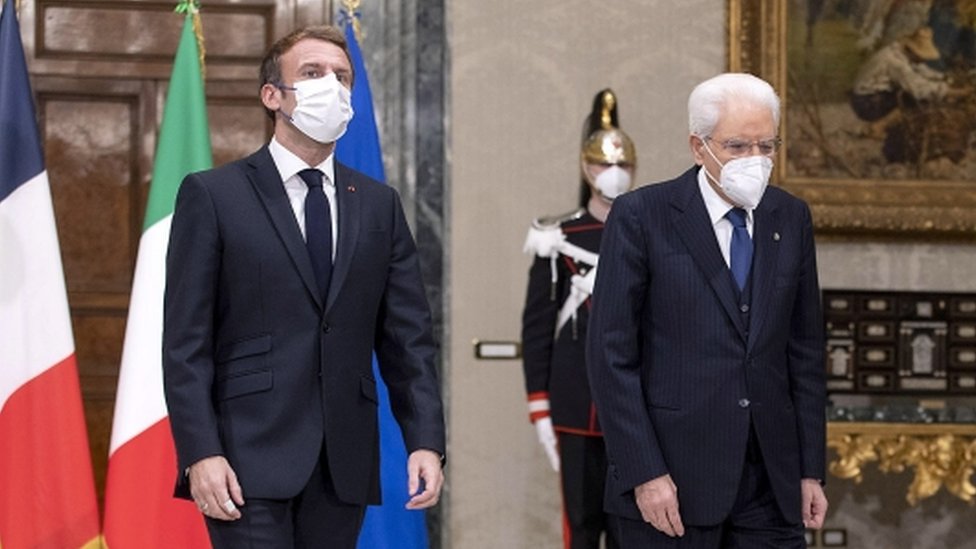 A handout photo made available by Quirinale Palace shows Italian President Sergio Mattarella and French President Emmanuel Macron during their meeting at Quirinale Palace in Rome, Italy, 25 November 2021