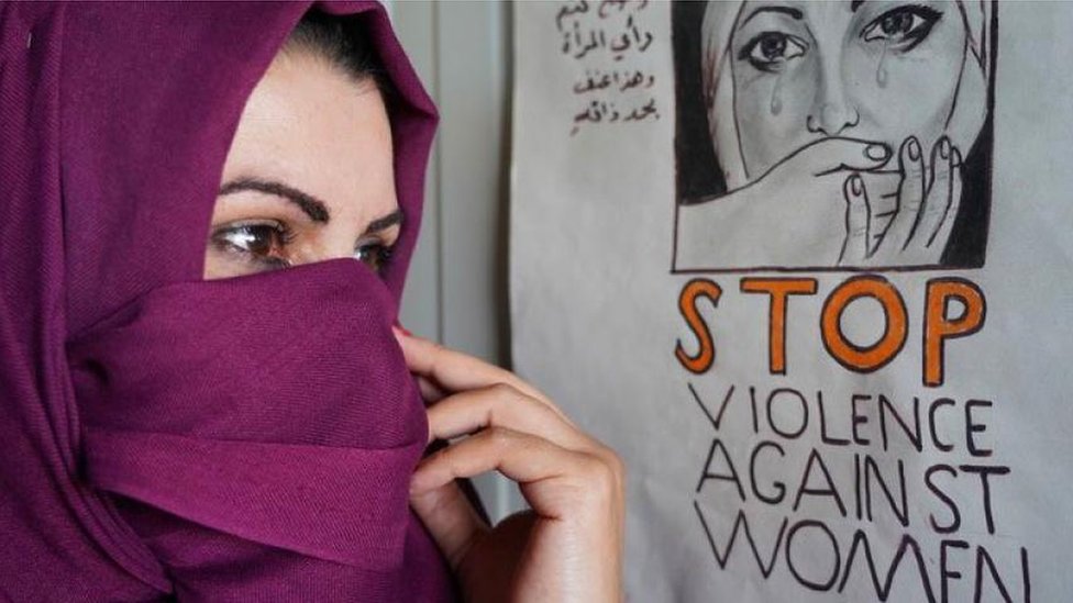 ملصق ضد العنف الأسري في العراق