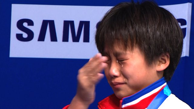 North Korea's Kim Kuk Hyang has an emotional reaction to her 10m platform dive win