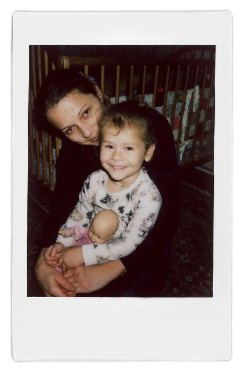 Поларроидная фотография Аны и ее дочери