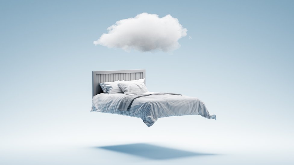Una cama con una nube.