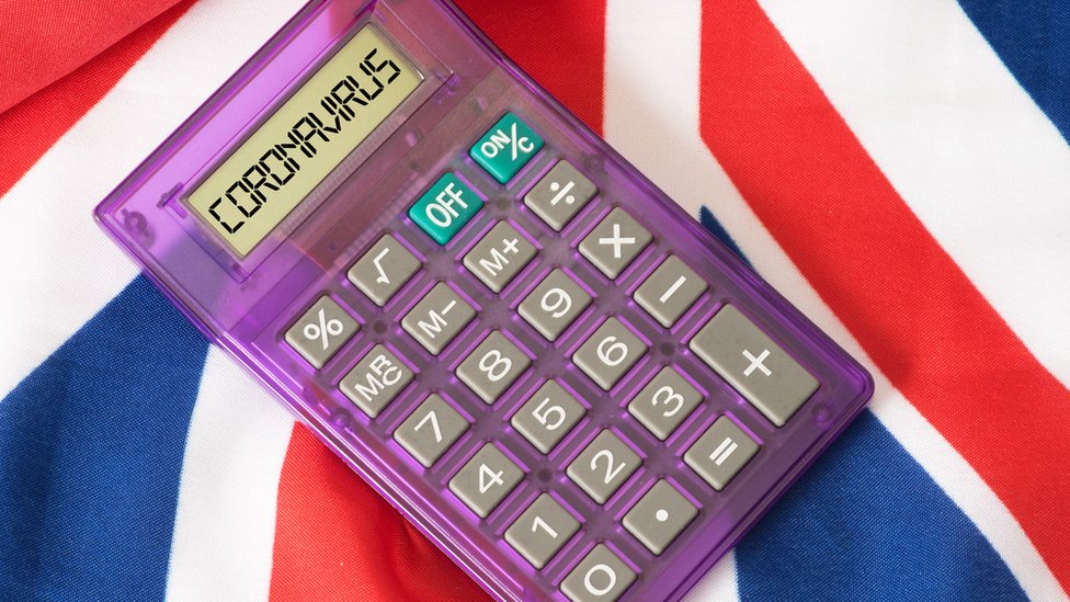 UK flag with a calculator - the word "coronavirus" is on the screen