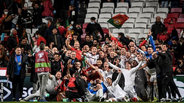 Serbia players celebrate their win