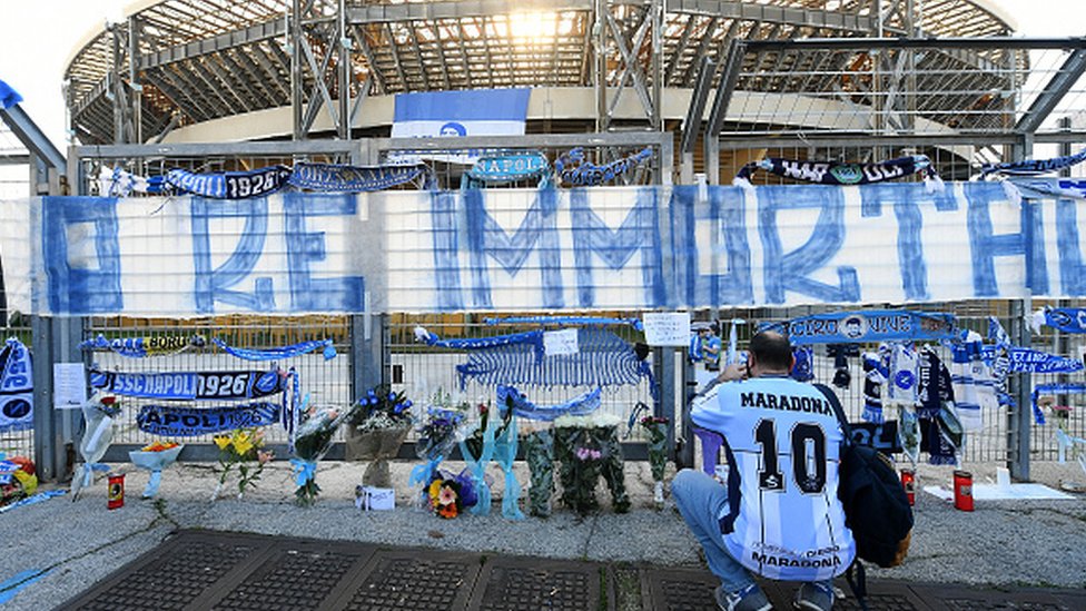 An SSC Napoli fan in mourning for Maradona