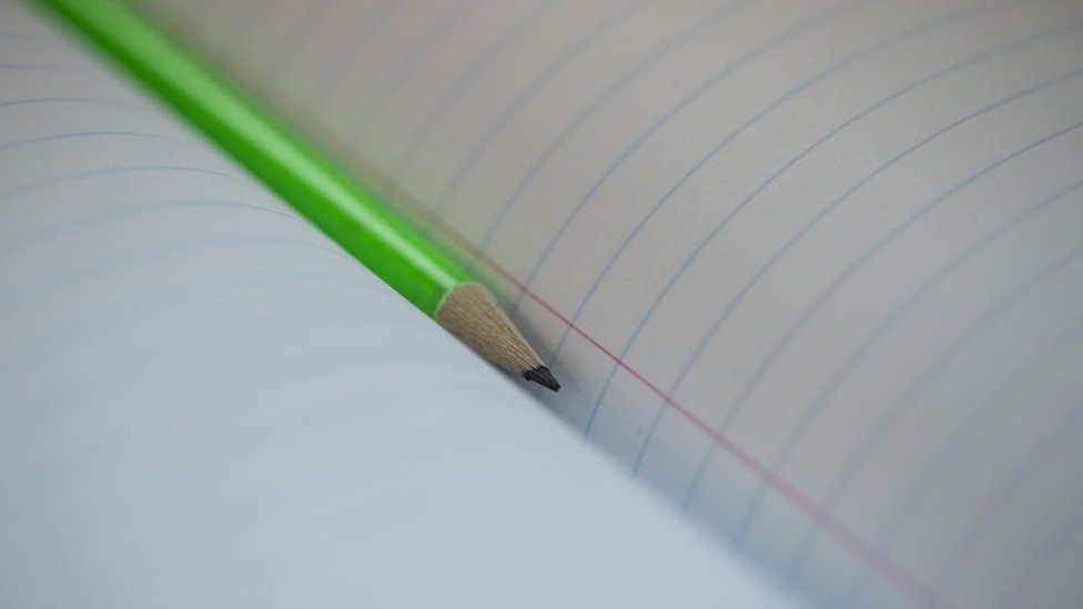 Cuaderno con lápiz
