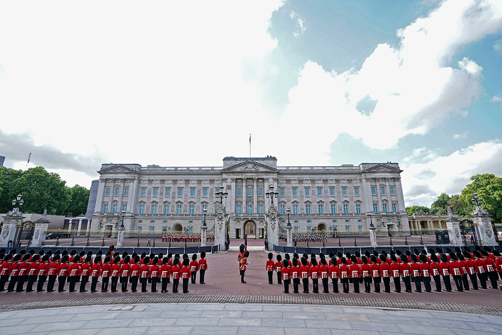 Coldstream Guards outside Buckingham Palace, ahead of the ceremonial procession of the coffin of Queen Elizabeth II from Buckingham Palace to Westminster Hall, London, on 14 September 2022