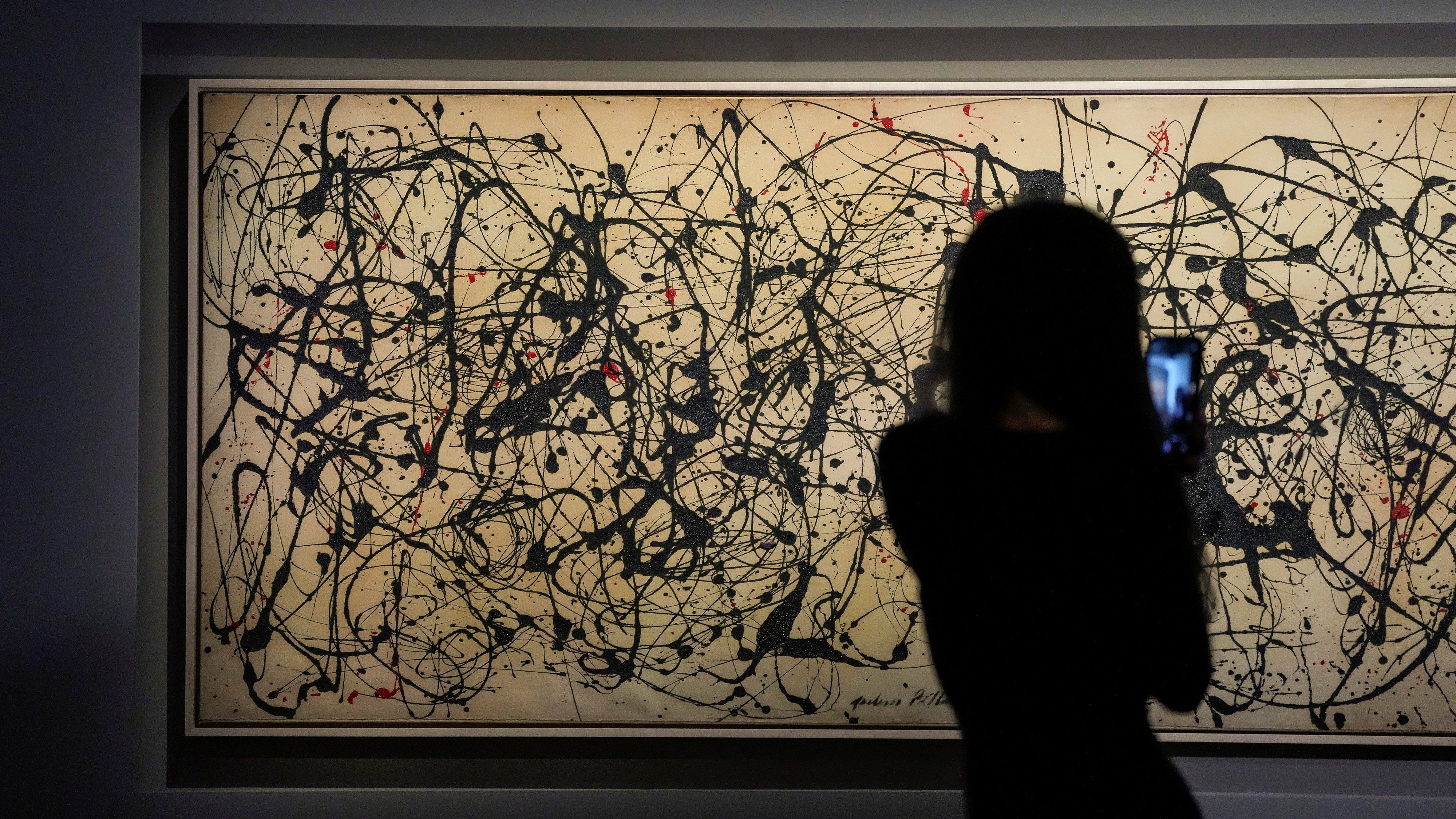 Jackson Pollock painting sells for record $181m at US auction