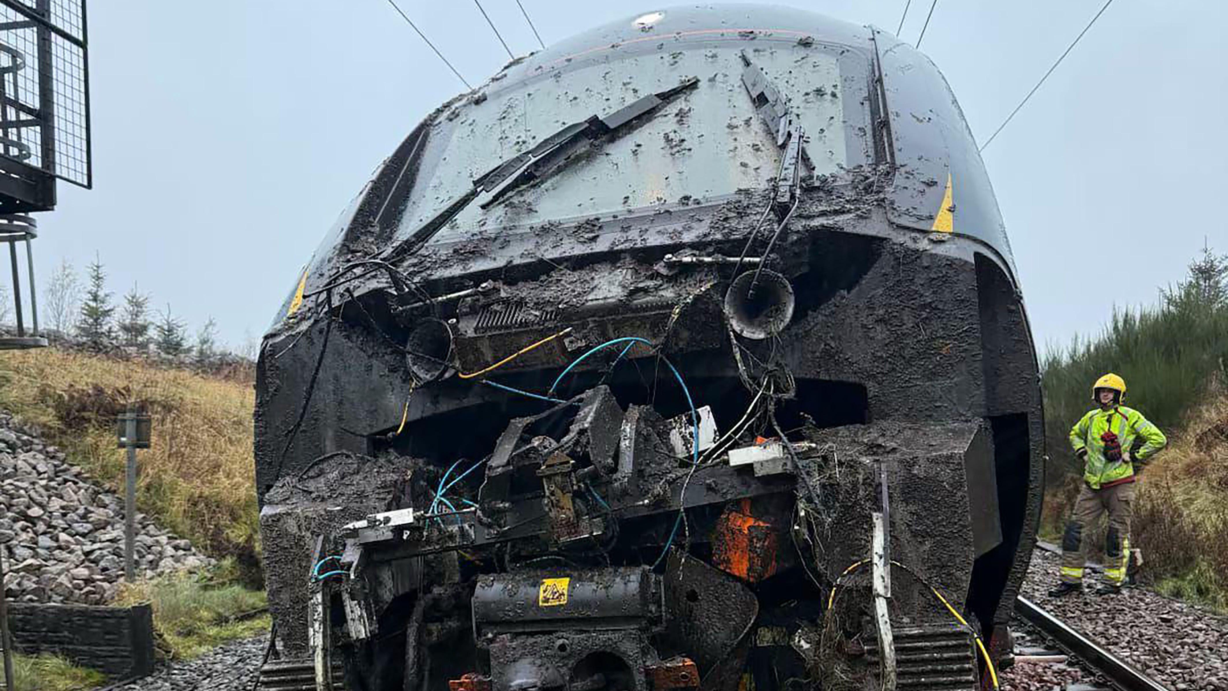 West Coast Mainline blocked as train derails in Cumbria - BBC News