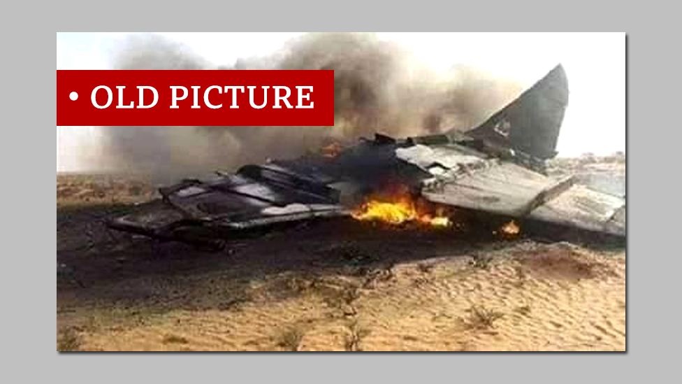 Screen grab of downed fighter plane labelled old picture