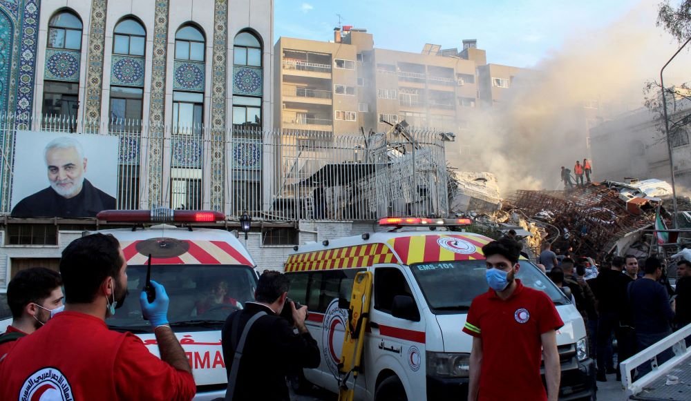 The rubble of a destroyed building lies next to Iran's consulate in Damascus on 1 April 2024