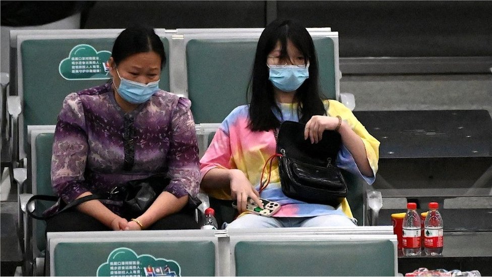Relatives of passengers on China Eastern flight MU5375 are seen at the holding area, after the plane failed to arrive at Guangzhou Baiyun International Airport in China's southern Guangdong province on March 22, 2022.