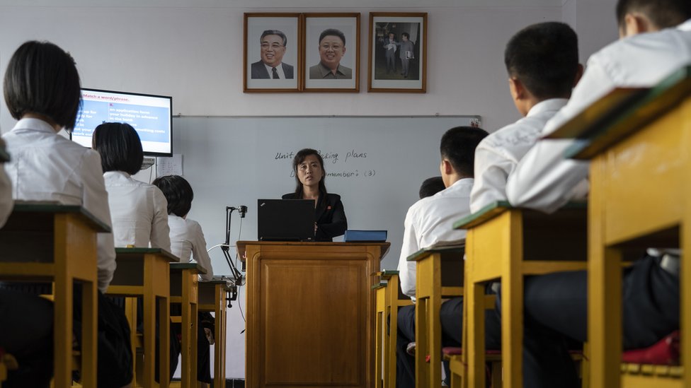 A teacher in front of her class
