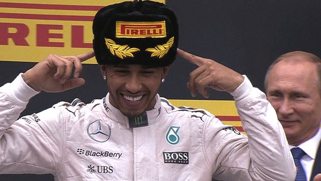 Mercedes' Lewis Hamilton and Vladimir Putin