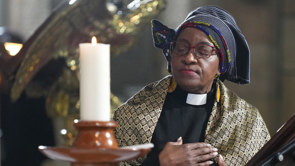 Mpho Tutu, daughter of late South African anti-Apartheid icon Archbishop Desmond Tutu, takes a moment during the state funeral of Tutu at St. George"s Cathedral in Cape Town, South Africa, 01 January 2022.